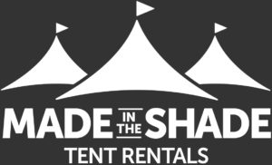 Made in the Shade logo in reverse white with dark background