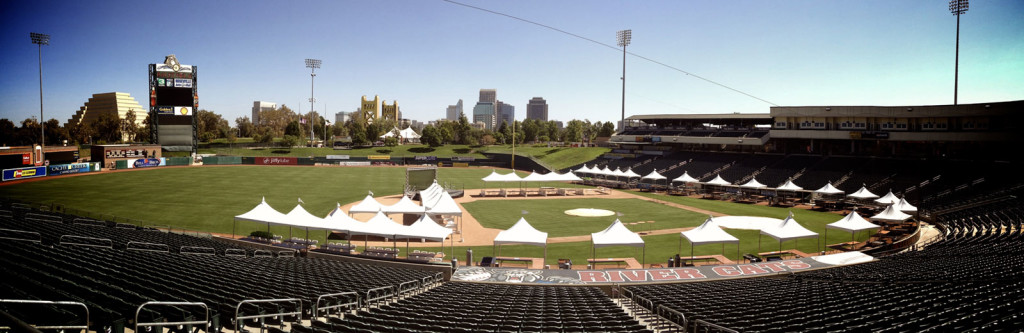 An image of small tents at a baseball field