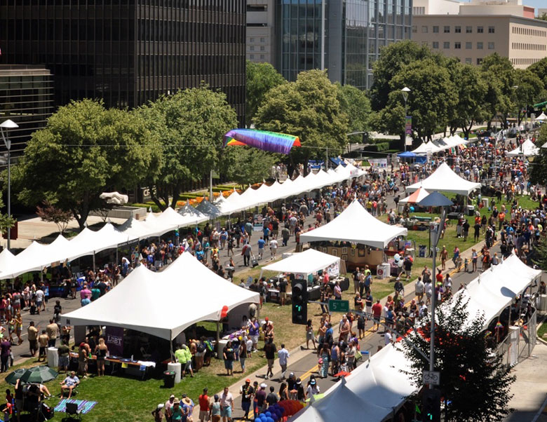 An image of tents at a gay pride festival